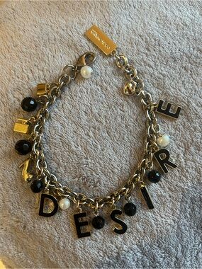 Dolce & Gabbana The One Gold Tone “Desire” Charm Bracelet